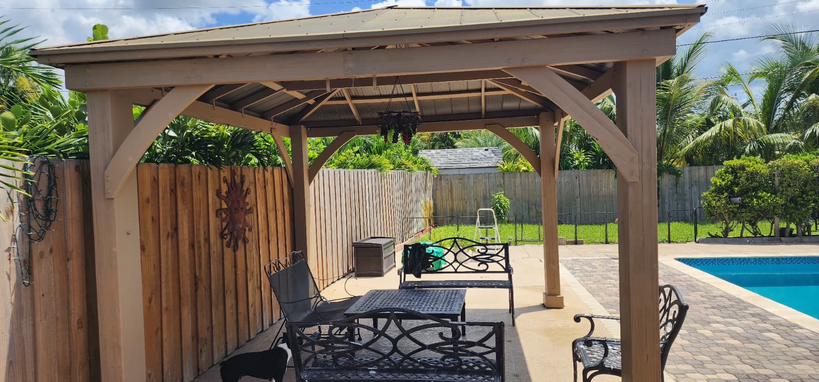 Front detail of restored and repainted wood gazebo in West Palm Beach