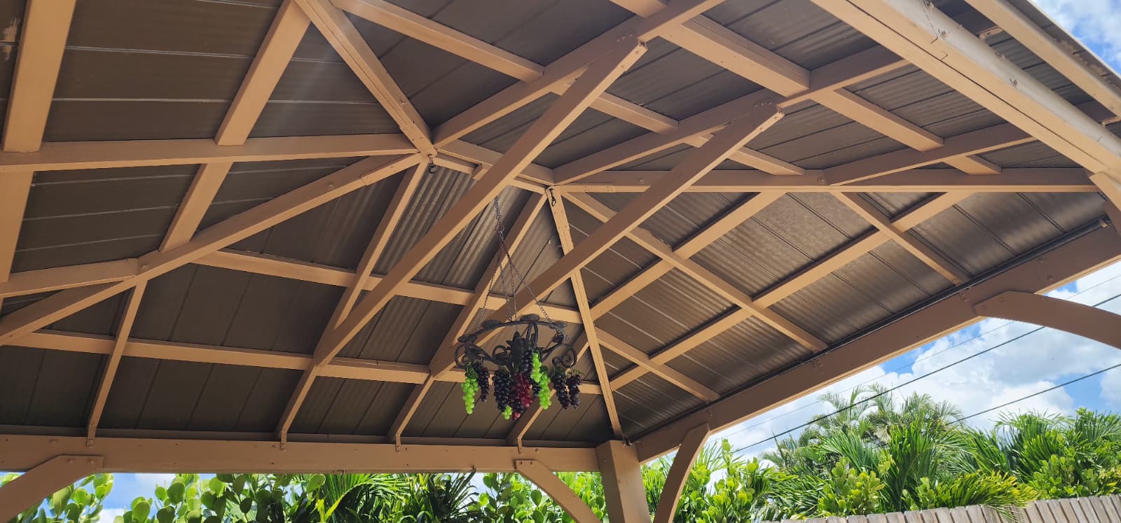 Repaired and repainted framing beneath the gazebo roof